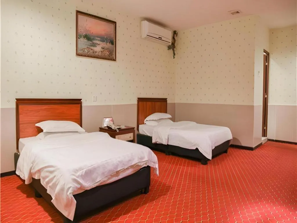 Bed in Renhe Good East Hotel