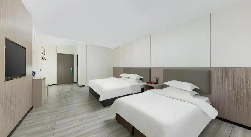 Bed in Renhe Good East Hotel