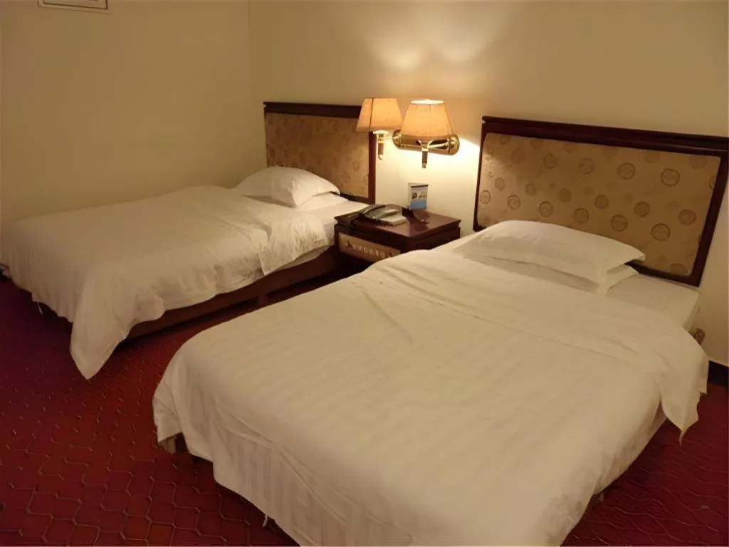 Bed in Renhe Good East Hotel