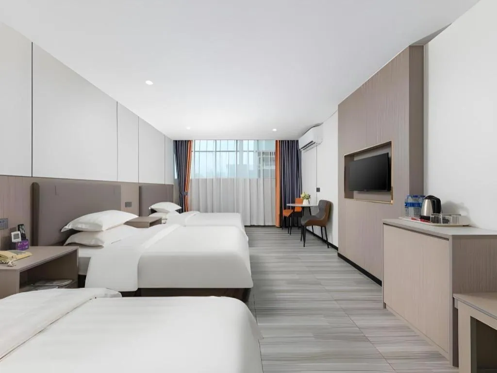 Bed in Renhe Good East Hotel