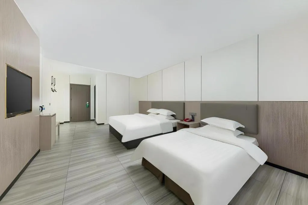 Bed in Renhe Good East Hotel