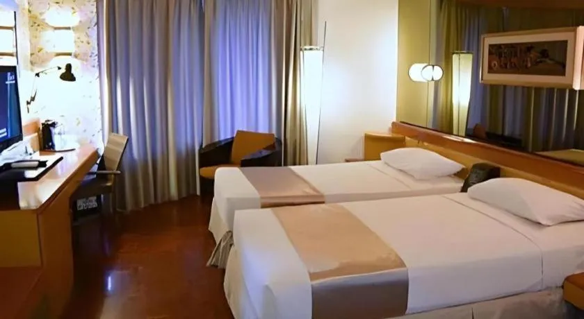 Bed in KLUB BUNGA THEME PARK HOTEL