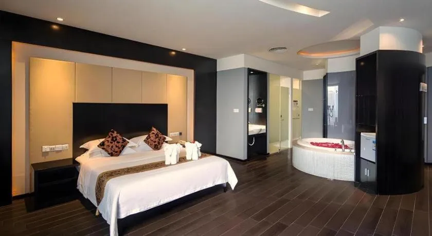 Bed in Guangdong Nanmei Osotto Hotel