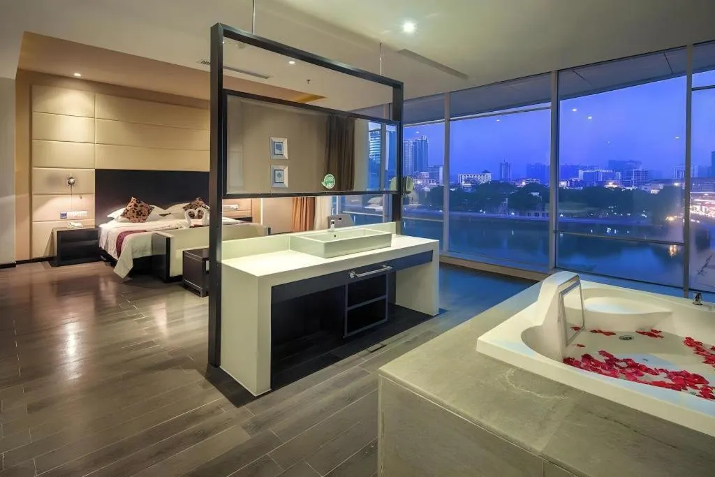 Bed in Guangdong Nanmei Osotto Hotel