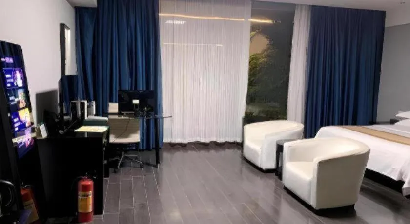 Bed in Guangdong Nanmei Osotto Hotel