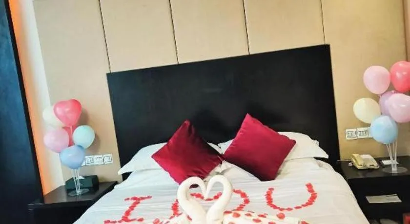 Bed in Guangdong Nanmei Osotto Hotel