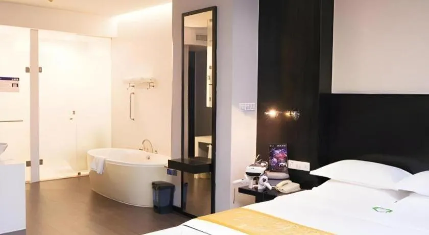 Bed in Guangdong Nanmei Osotto Hotel