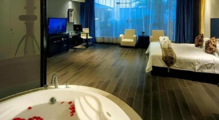 Bed in Guangdong Nanmei Osotto Hotel