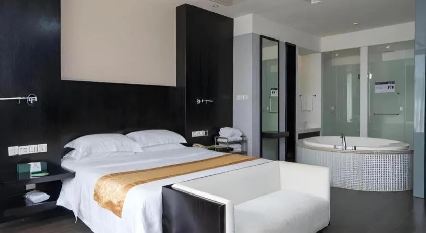 Bed in Guangdong Nanmei Osotto Hotel