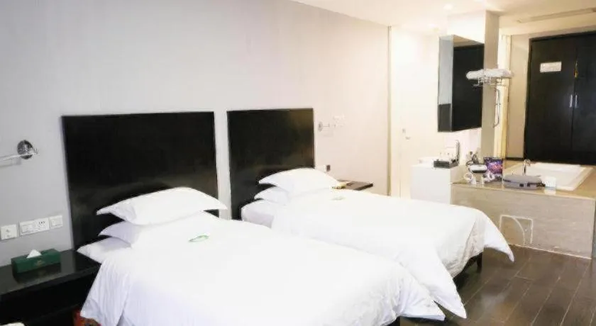 Bed in Guangdong Nanmei Osotto Hotel