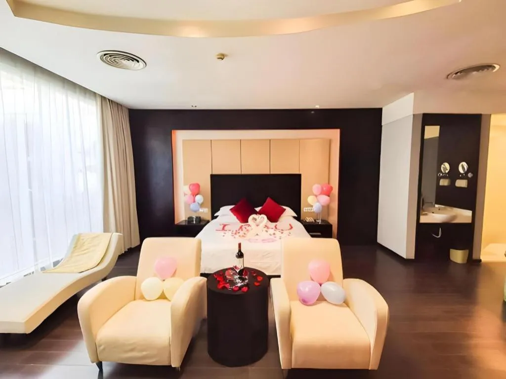 Bed in Guangdong Nanmei Osotto Hotel