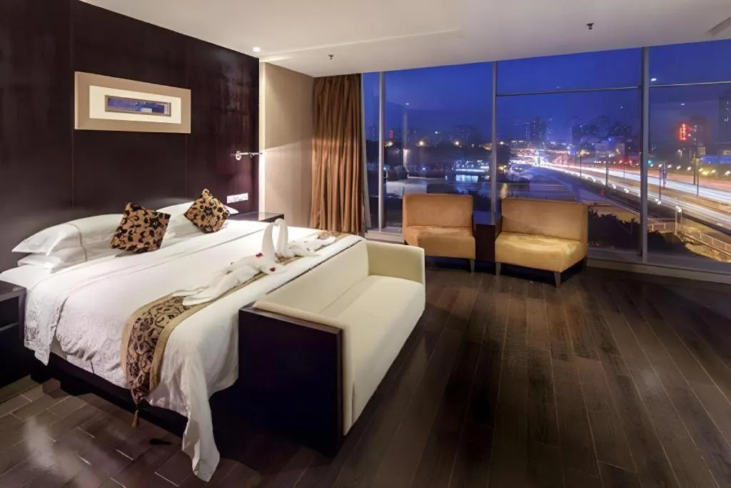 Bed in Guangdong Nanmei Osotto Hotel