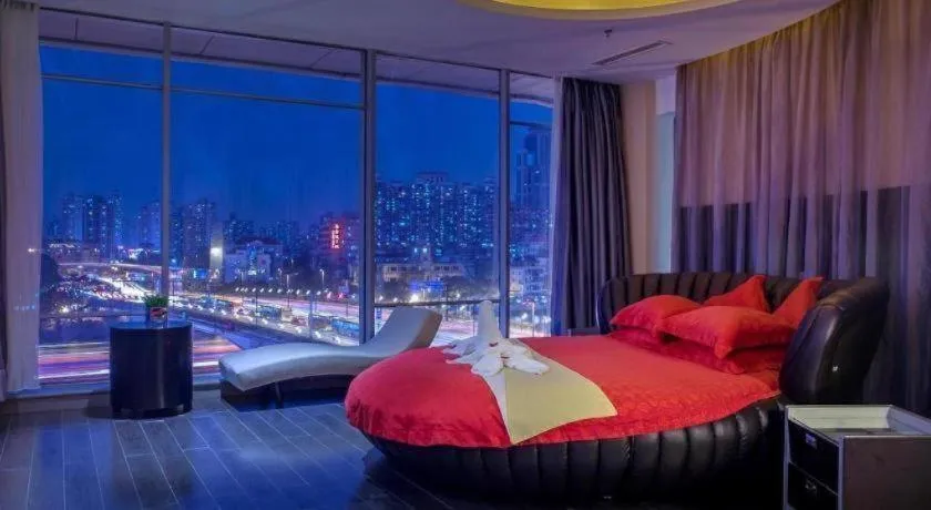 Bed in Guangdong Nanmei Osotto Hotel