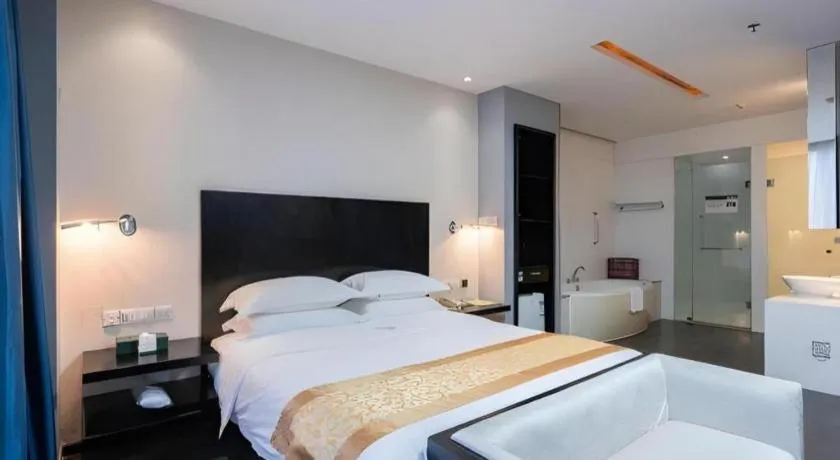 Bed in Guangdong Nanmei Osotto Hotel