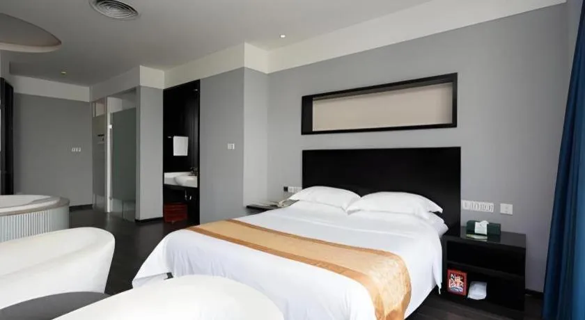 Bed in Guangdong Nanmei Osotto Hotel