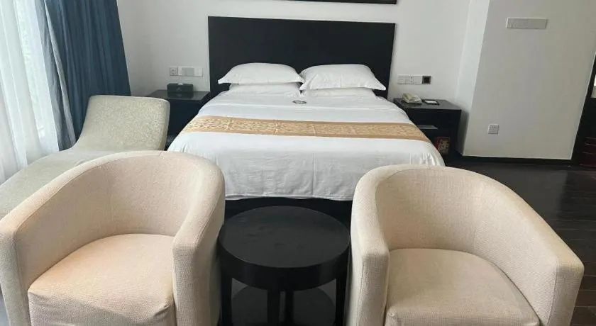 Bed in Guangdong Nanmei Osotto Hotel