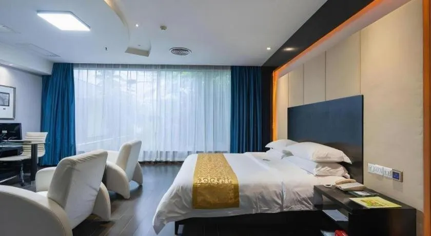 Bed in Guangdong Nanmei Osotto Hotel