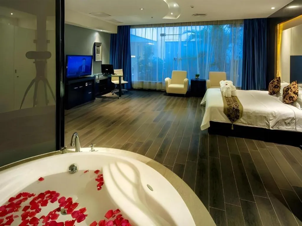 Bed in Guangdong Nanmei Osotto Hotel