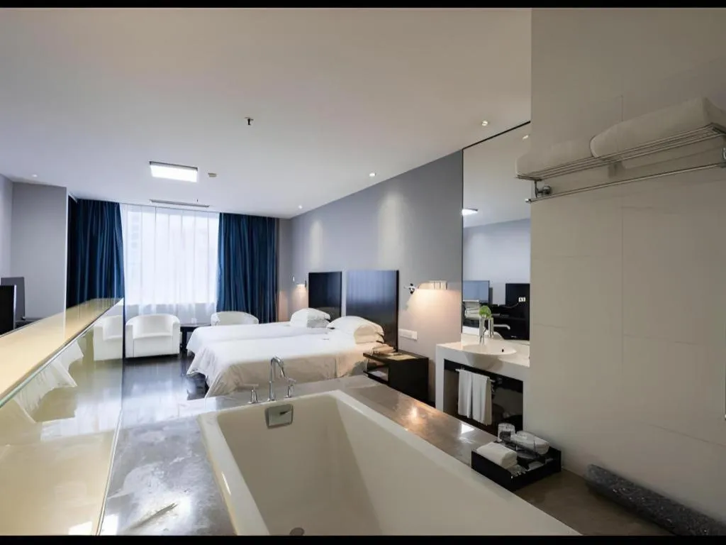 Bed in Guangdong Nanmei Osotto Hotel