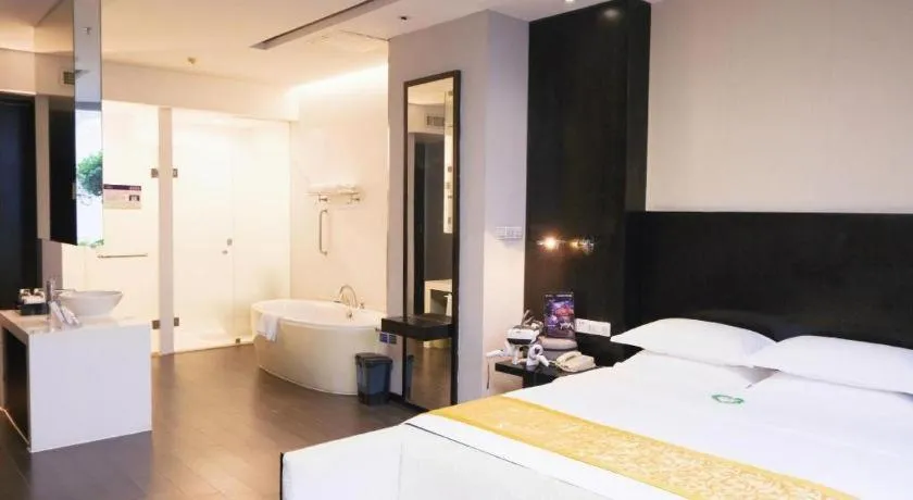 Bed in Guangdong Nanmei Osotto Hotel