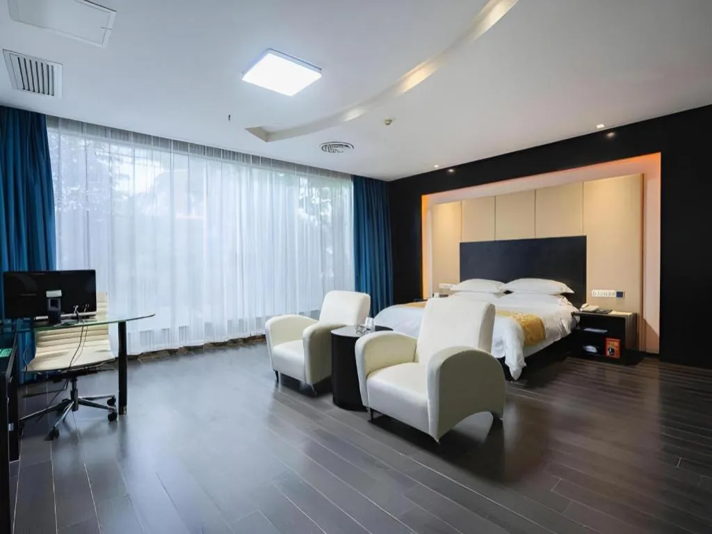 Bed in Guangdong Nanmei Osotto Hotel