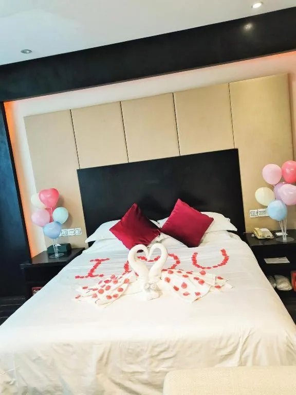 Bed in Guangdong Nanmei Osotto Hotel