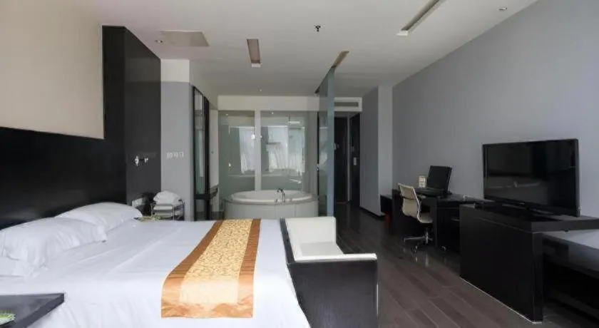 Bed in Guangdong Nanmei Osotto Hotel