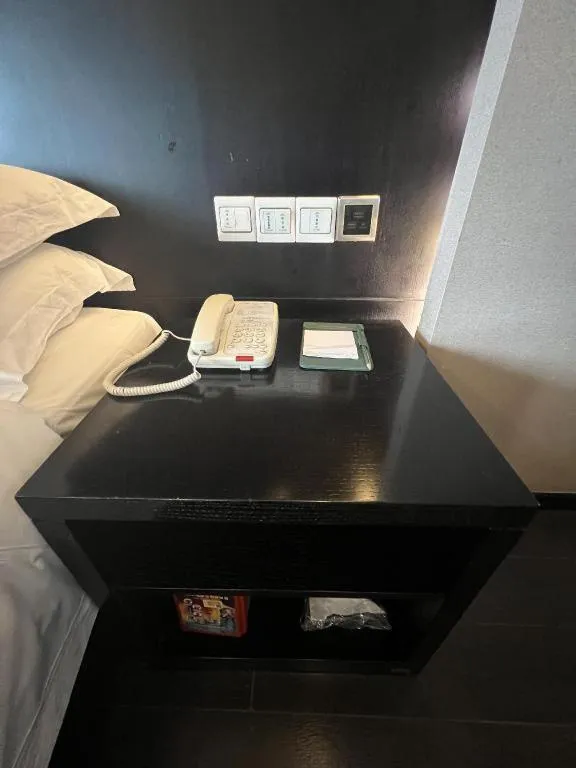 Bed in Guangdong Nanmei Osotto Hotel