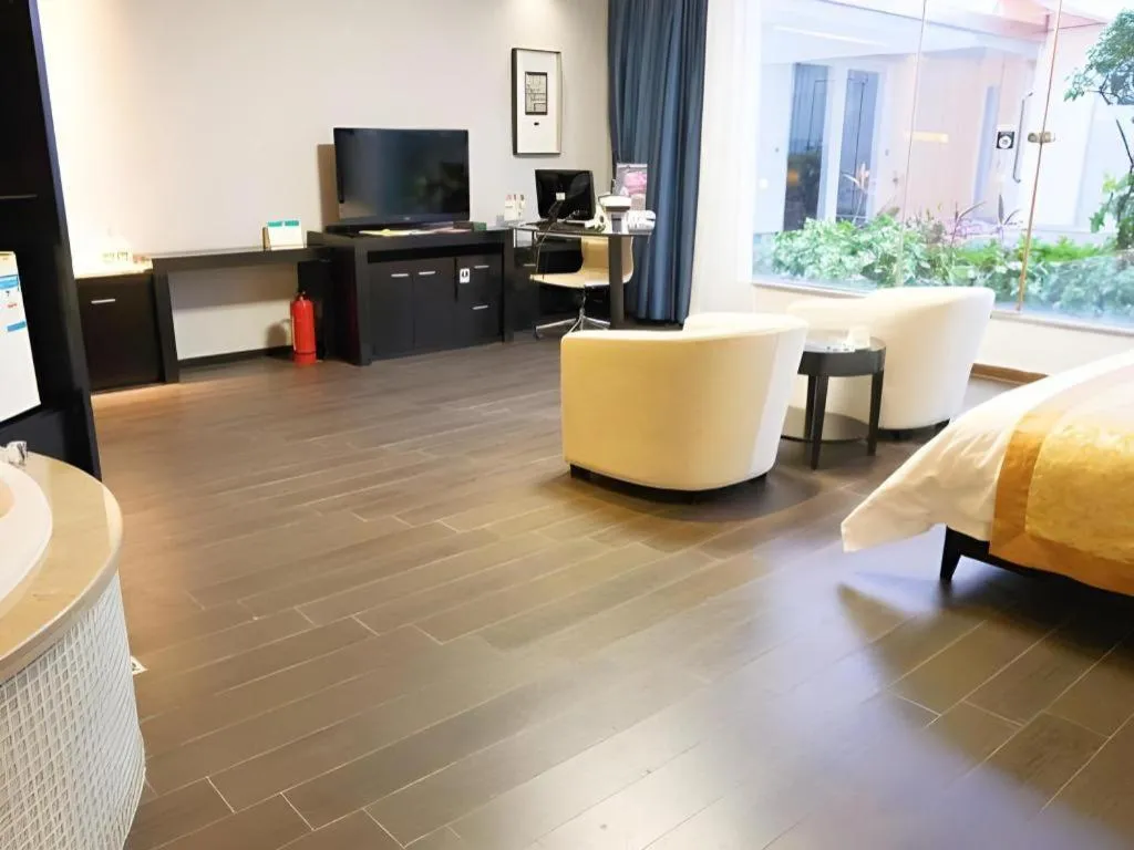 Bed in Guangdong Nanmei Osotto Hotel