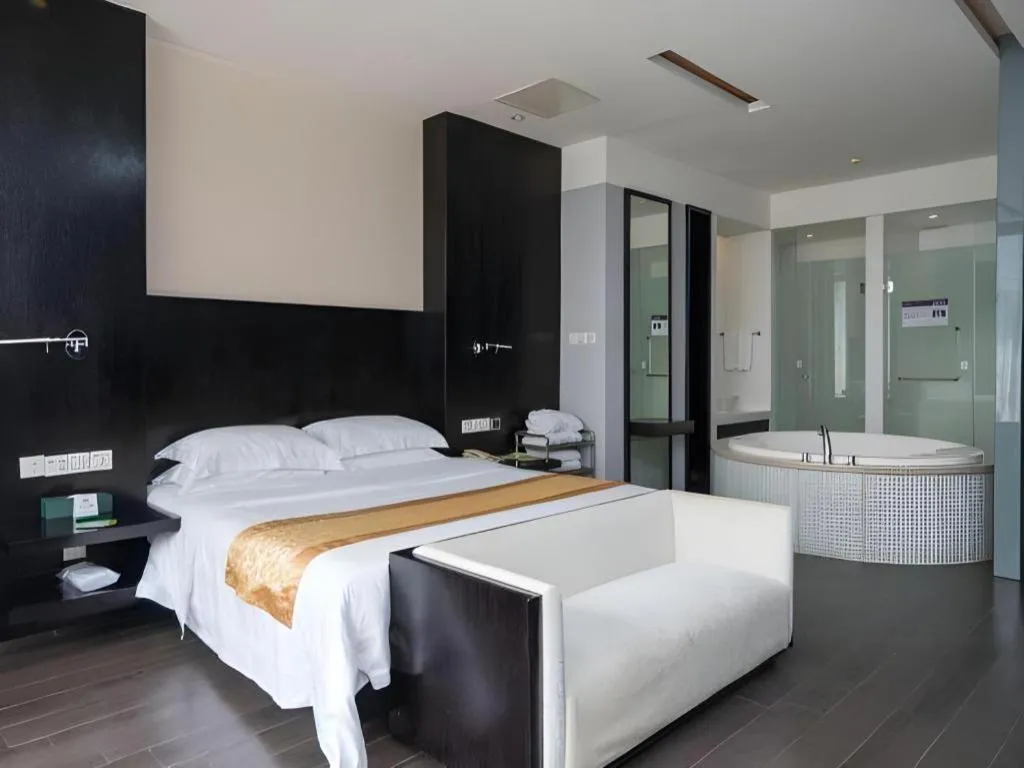 Bed in Guangdong Nanmei Osotto Hotel