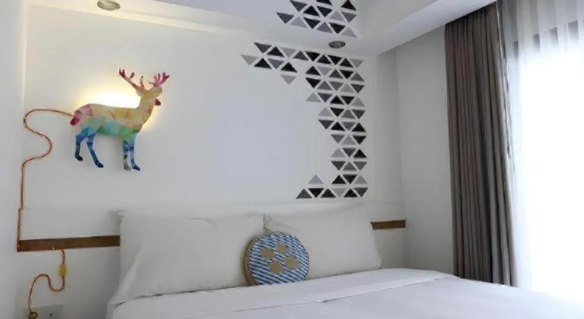 Bed in The Silk at Dago Boutique Hotel