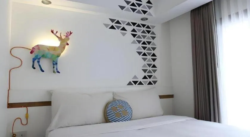 Bed in The Silk at Dago Boutique Hotel