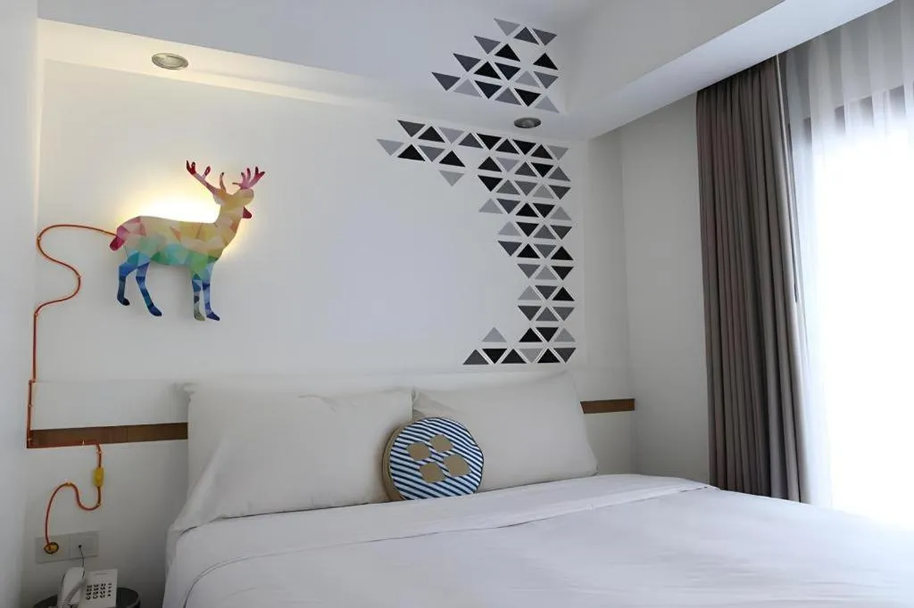 Bed in The Silk at Dago Boutique Hotel