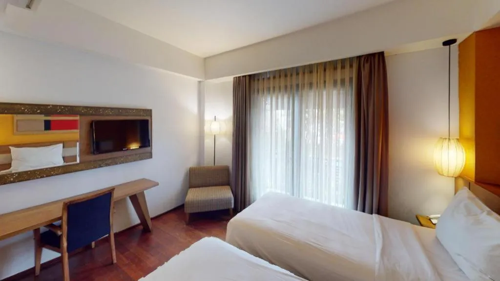 Bed in The Silk at Dago Boutique Hotel