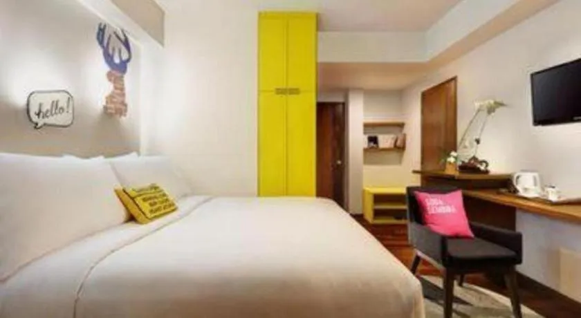 Bed in The Silk at Dago Boutique Hotel