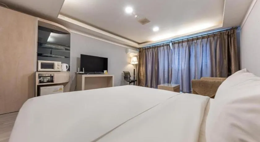 Bed in Metro Tourist Hotel Cheonan