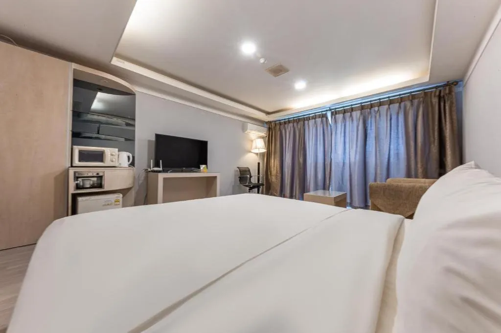 Bed in Metro Tourist Hotel Cheonan