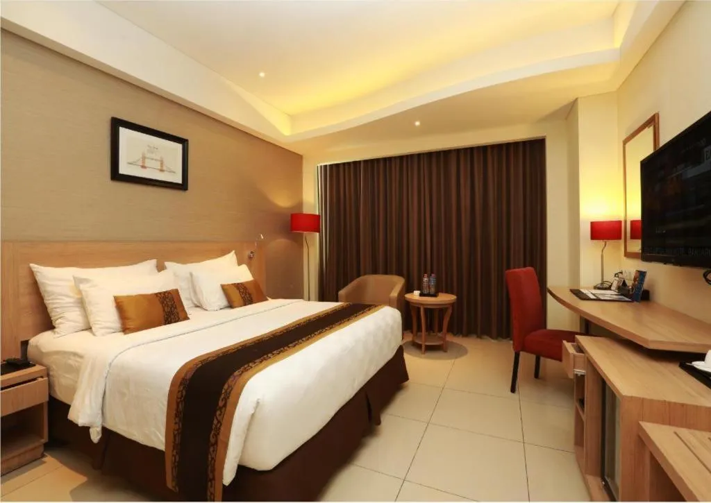 Bed in Golden Tulip Galaxy Hotel Banjarmasin