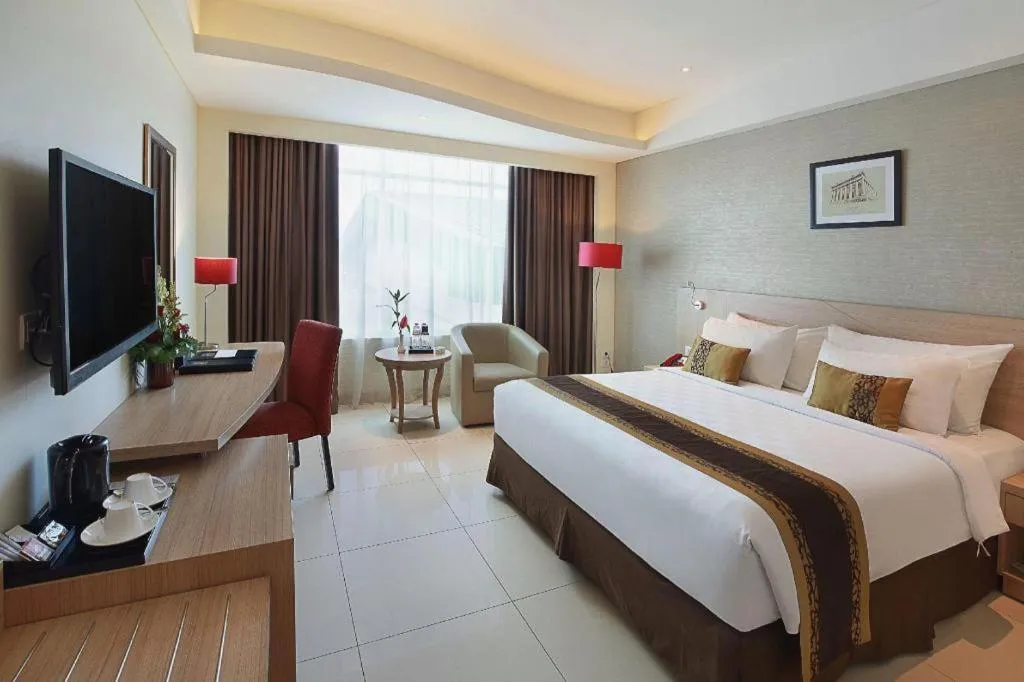 Bed in Golden Tulip Galaxy Hotel Banjarmasin