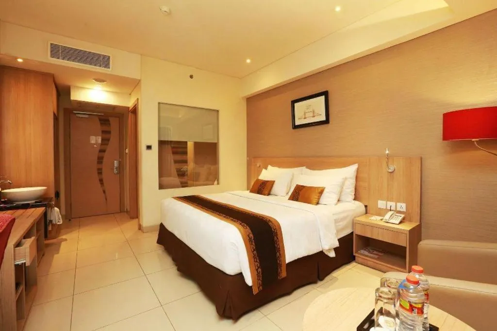 Bed in Golden Tulip Galaxy Hotel Banjarmasin