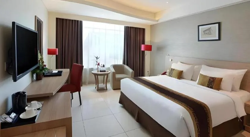 Bed in Golden Tulip Galaxy Hotel Banjarmasin