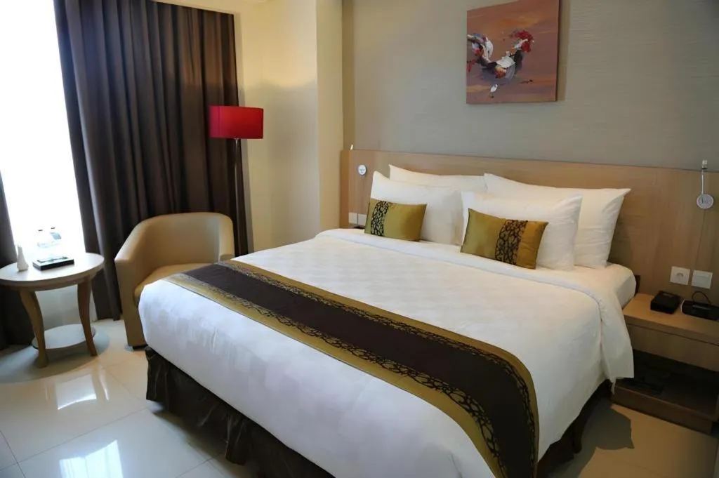Bed in Golden Tulip Galaxy Hotel Banjarmasin