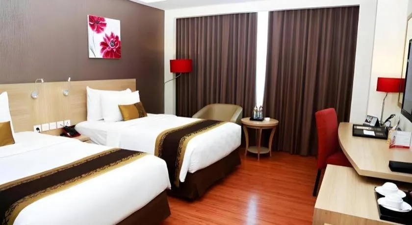 Bed in Golden Tulip Galaxy Hotel Banjarmasin