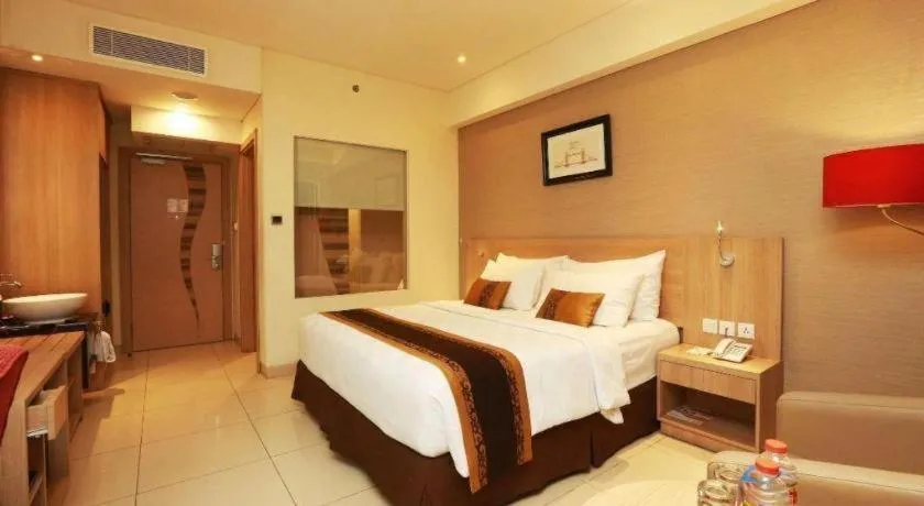 Bed in Golden Tulip Galaxy Hotel Banjarmasin