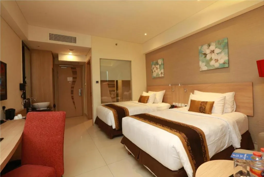 Bed in Golden Tulip Galaxy Hotel Banjarmasin