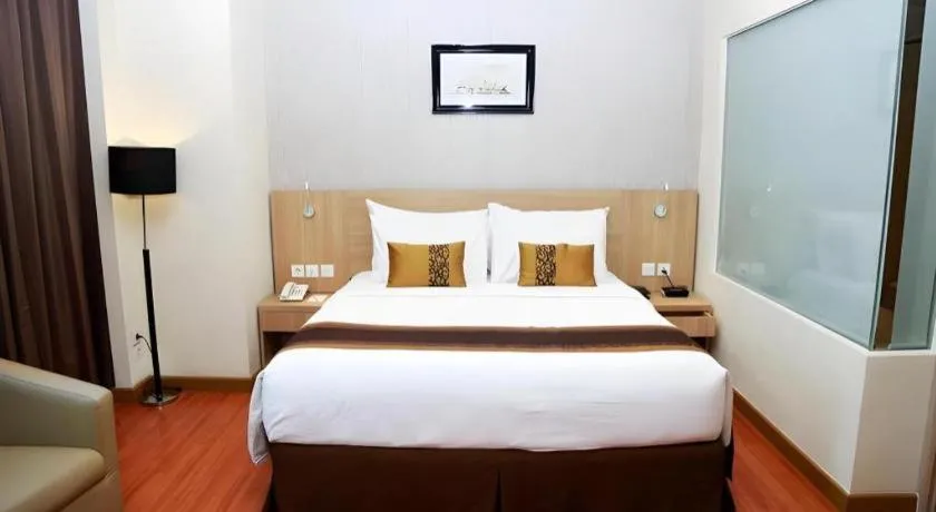 Bed in Golden Tulip Galaxy Hotel Banjarmasin