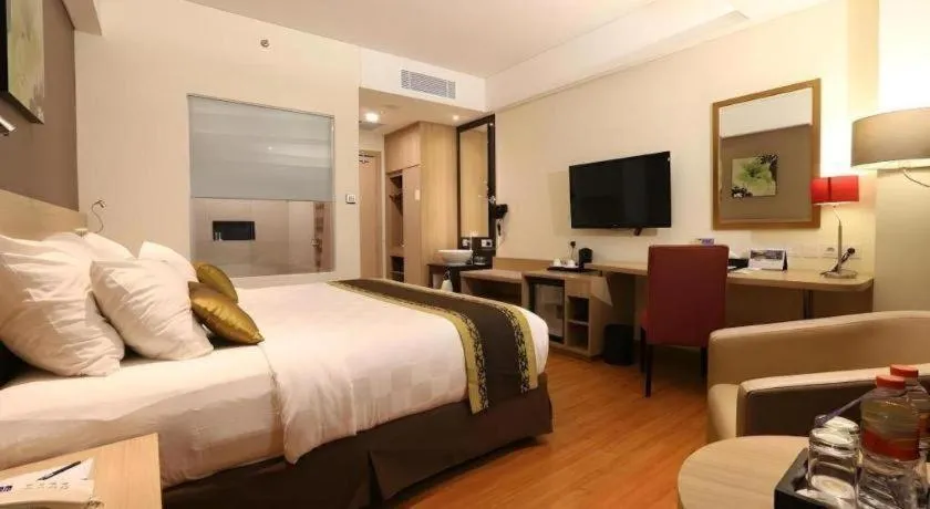 Bed in Golden Tulip Galaxy Hotel Banjarmasin
