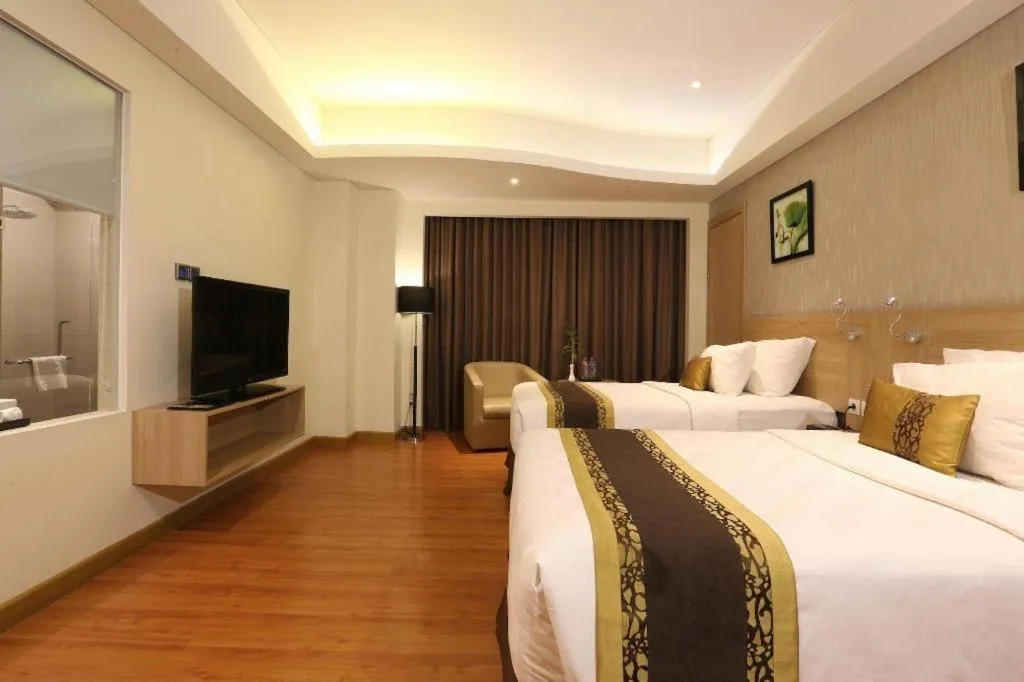 Bed in Golden Tulip Galaxy Hotel Banjarmasin