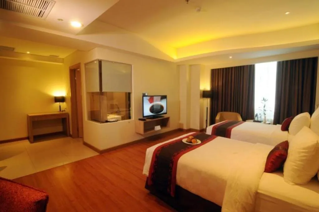 Bed in Golden Tulip Galaxy Hotel Banjarmasin