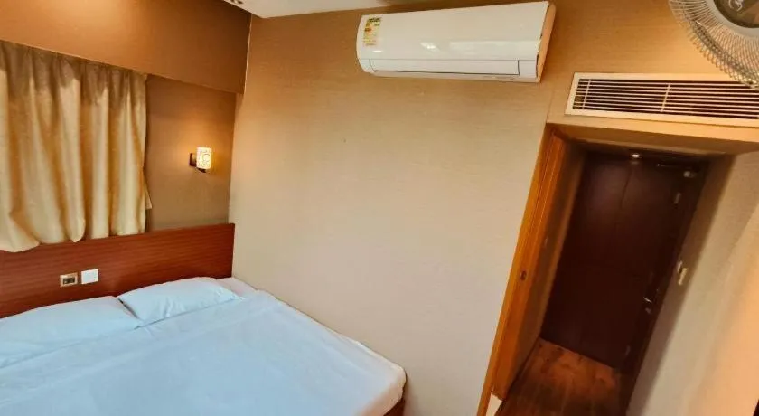 Bed in VP Apartments